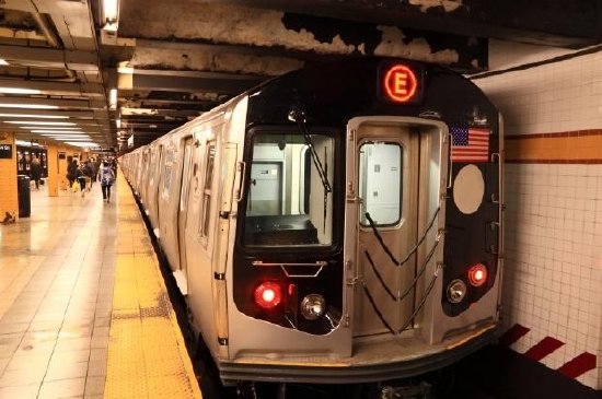 E Train in Station, New York Metro, USA