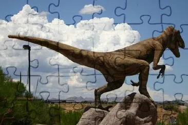 Staty av en Velociraptor dinosaurie