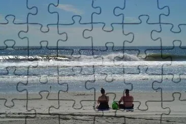 Sitting on the beach jigsaw puzzle