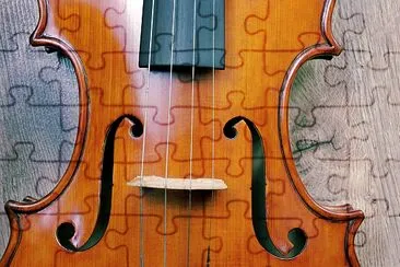 Violin on a wooden background jigsaw puzzle