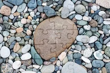 pebbles on the beach with one big pebble jigsaw puzzle