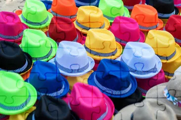 Colorful Panama hats for sale from a sidewalk vend jigsaw puzzle