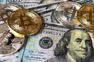 BitCoins et dollars américains