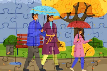 Família caminhando na chuva