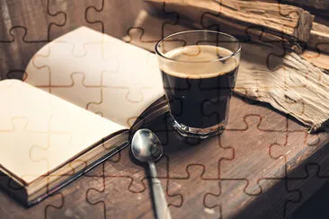 Glass of Coffee with an old Book jigsaw puzzle