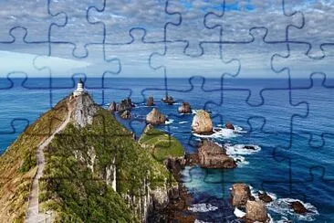 faro en playa jigsaw puzzle