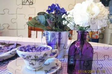 Tea Cup and Purple Bottle