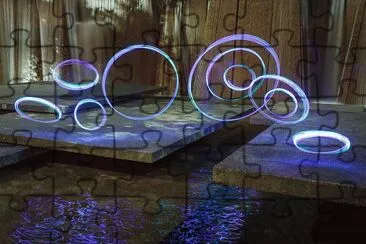 light sculpture over pond jigsaw puzzle