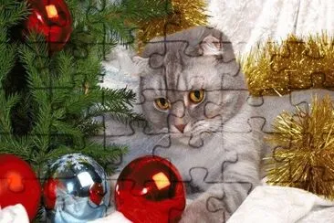 Katze mit Weihnachtskugeln jigsaw puzzle