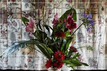 Floral Arrangement Against Textile Backdrop