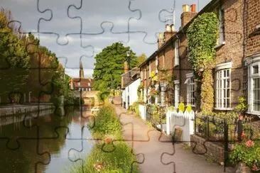 channel_flowers_grass_path_river_houses_suburbs_ jigsaw puzzle