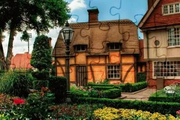 nature_house_flowers_flowerbed_ jigsaw puzzle