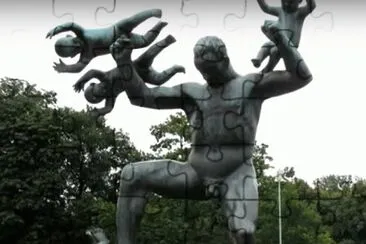 Sculpture of Man balancing babies