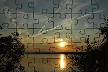 Criss-crossing contrails at sunset   L jigsaw puzzle