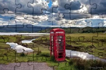 Scottish highland red Phonebox jigsaw puzzle