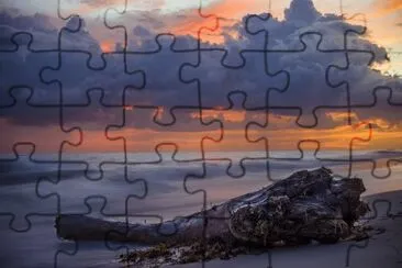 Por do sol  na praia jigsaw puzzle