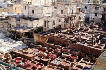 Vats of fabric dye at factory in Morocco jigsaw puzzle