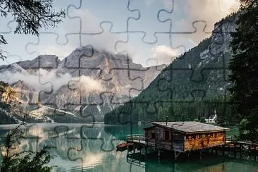 Boathouse on a mountain lake jigsaw puzzle