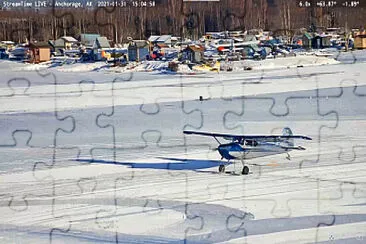 פאזל של Ski landing on lake-2 blue plane