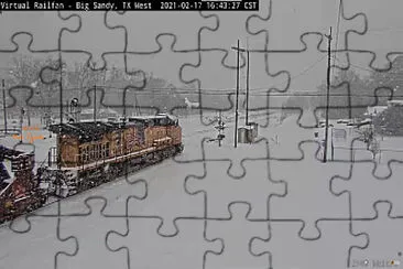 UP-5980 in snow storm Big Sandy,TX/USA jigsaw puzzle