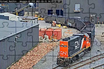 CN-9604 switching hopper cars at Waupaca,WI/USA fa