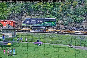 HSC NS-6220  on flat car transport to Altoona shop jigsaw puzzle