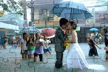 Newlyweds in rain