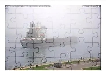 Ship arrival in heavy fog on St Clair River jigsaw puzzle