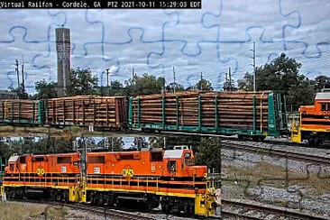 Log train pulled by HOG-2124   HOG-2125 at Cordele,GA/USA