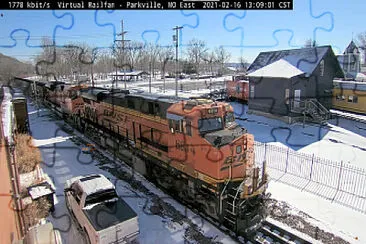 פאזל של BNSF-6814 passing thru Parkville,MO/USA in the SNOW