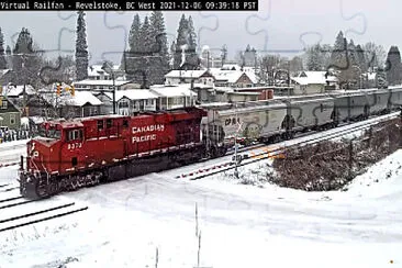 CP-9370 approaching the Revelstoke in the snow jigsaw puzzle