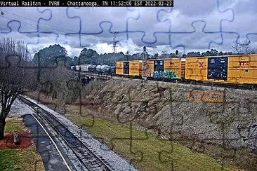 Yellow TTX box cars, some no graffiti at Chattanooga,TN/USA jigsaw puzzle