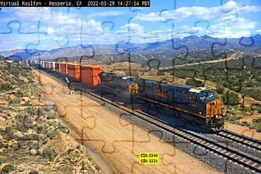 Stunning desert and train CSX-3244   CSX-3331 passing Hesperia,CA/USA jigsaw puzzle