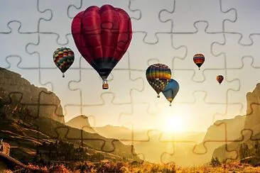 Hot Air Balloons over Canyon at Sunrise