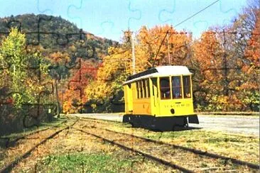 Car No. 10 departing wih Fall Foliage