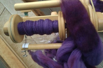 Spinning Purple Wool