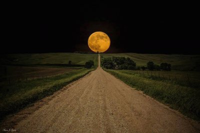 super moon over road