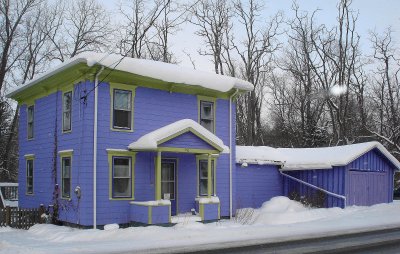 Snow Covered Purple House