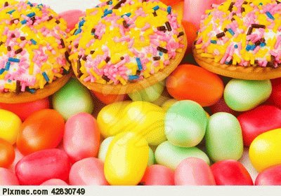 sweet-cakes-and-colourful-gums-at-the-background-c