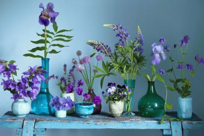 Flowers in Antique Glass Containers