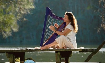 Playing Purple Harp by Peaceful Lake