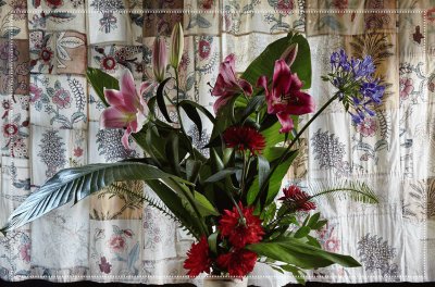 Floral Arrangement Against Textile Backdrop