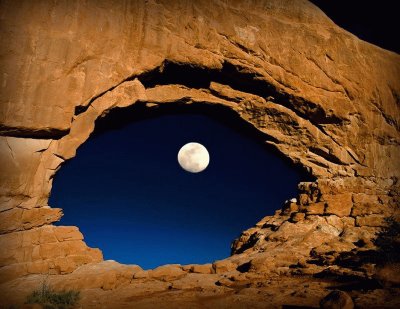 the-moon-through-north-window-arches-national-park