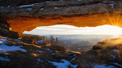 The sun peeks through Mesa Arch in Canyonlands Nat jigsaw puzzle