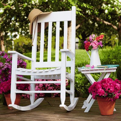 White Rocking Chair with Potted Azaleas