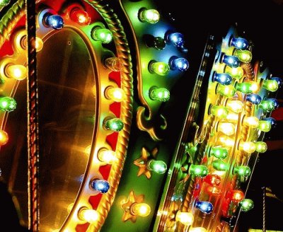 close up of carnival lights on carousel