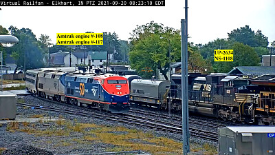 פאזל של Amtrak engines 108 and 117 overtaking oil tanker train, Elkhart,IN/USA