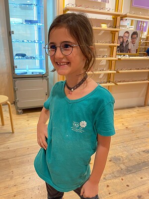 a beautiful girl with glasses